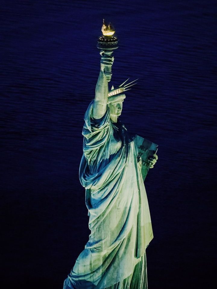The Statue of Liberty seen from the aircraft at night